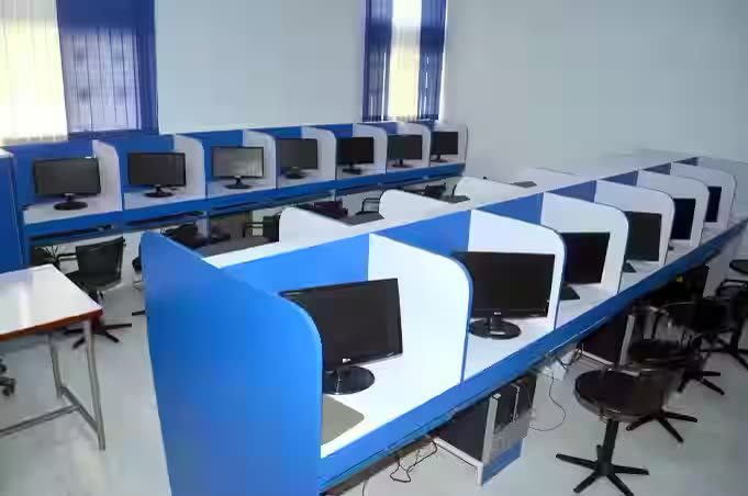 Computer lab with rows of monitors
